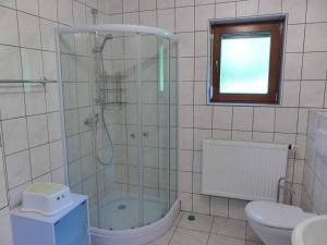 Koupelna v ubytování FeWo H.Reußwig + 13 fotografií