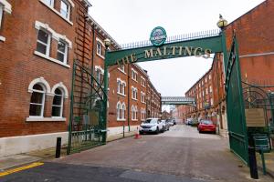 a sign that reads the waiting gate on a street at Platform City Theatre Studio with Secure Parking in Hull