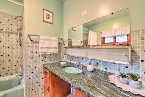 a bathroom with a sink and a mirror at Old Time Catskill Mtn Retreat, Handcrafted Cabin! in Cornwallville
