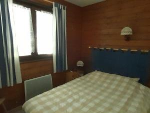 Postel nebo postele na pokoji v ubytování Appartement duplex à Châtel - 3 pièces, 6 personnes, parking couvert, proche télésiège et navettes - FR-1-198-104