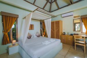 Postel nebo postele na pokoji v ubytování Punnpreeda Beach Resort - SHA Plus Certified