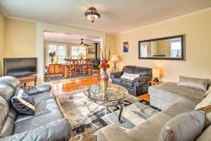 a living room with couches and a coffee table at Fort Bragg Home, Close to Laguna Point Beach! in Fort Bragg