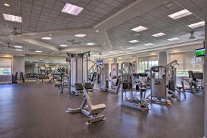 a gym with several treadmills and cardio machines at Luxury Naples Home with Private Pool and Hot Tub! in Naples