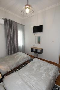 Posteľ alebo postele v izbe v ubytovaní Bratis House Athens