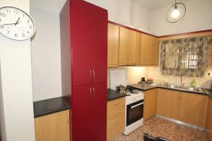 Kuchyňa alebo kuchynka v ubytovaní Bratis House Athens