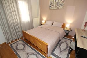 Posteľ alebo postele v izbe v ubytovaní Bratis House Athens