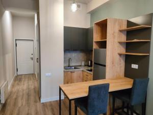 Kuchyň nebo kuchyňský kout v ubytování Tsaghkadzor Kechi Apartment 136