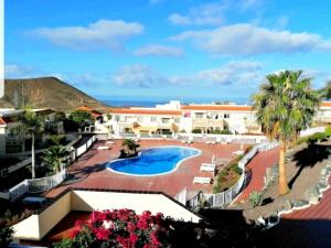 an aerial view of a resort with a swimming pool at Lovely Apartment in Tenerife South in Chayofa