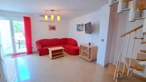 Et tv og/eller underholdning på APARTMENTS KAY