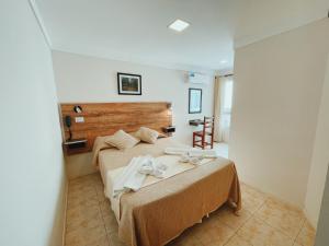 Кровать или кровати в номере Hotel Monet