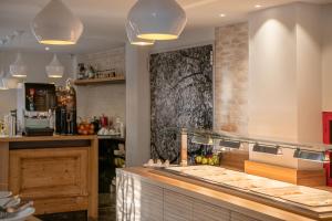 a kitchen with a counter and a counter top at Elia Kentron in Chania Town
