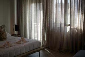 A bed or beds in a room at I Bannisti