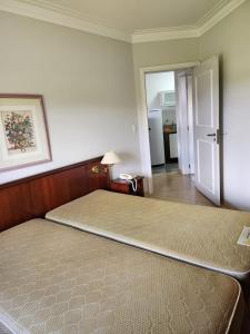 - une chambre avec 2 lits dans l'établissement AGUAS DE SÃO PEDRO VIP, à Águas de São Pedro