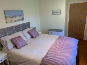 Postel nebo postele na pokoji v ubytování Rocco's Lodge a beautiful 3 bedroom holiday home