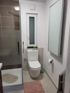 Kúpeľňa v ubytovaní Apartamenty pod Wilczakiem
