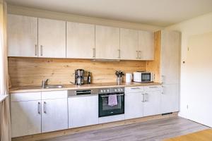 Kuchyň nebo kuchyňský kout v ubytování Ferienhaus Tidenkieker