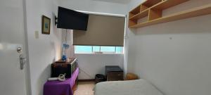 TV a/nebo společenská místnost v ubytování Private Cozy room with batroom in Miraflores