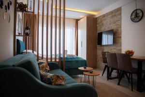 Гостиная зона в Apartman Larisa