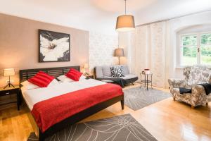 Łóżko lub łóżka w pokoju w obiekcie Schlosshotel Rosenau Superior