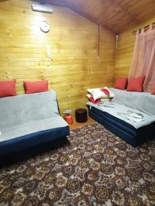 Rúm í herbergi á Vila NATAŠA