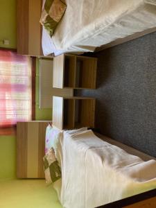 Posteľ alebo postele v izbe v ubytovaní Chata Kika - ubytovanie na súkromí