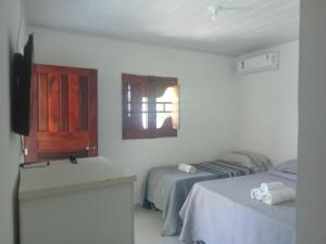TV a/nebo společenská místnost v ubytování FRANCÊS FLATS