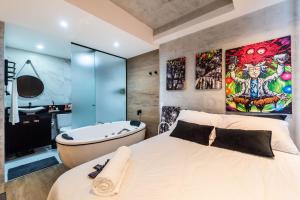 Cama o camas de una habitación en AA212 Studio sofisticado na Bela Vista