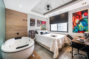 Cama o camas de una habitación en AA212 Studio sofisticado na Bela Vista