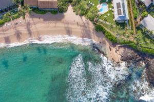an overhead view of a beach and the ocean at Napili Shores A202 OF Studio condo in Kahana +47 photos