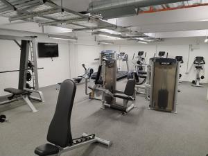 a gym with several treadmills and cardio machines at Earl Street124 in Sheffield