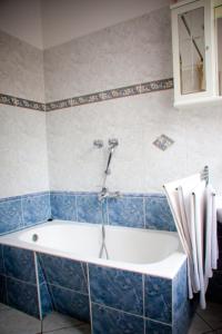 Kúpeľňa v ubytovaní Hárs Thermál Hotel