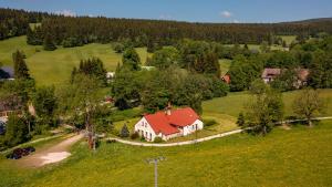 an aerial view of a house with a red roof at Horská chata Medika in Horní Maršov