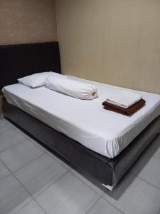 Postel nebo postele na pokoji v ubytování GRIYA BUNDA