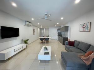 Magnum Serviced Apartmentsにあるテレビまたはエンターテインメントセンター