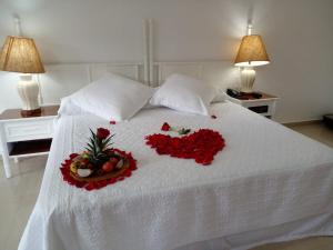 Postel nebo postele na pokoji v ubytování Hotel Zaracay