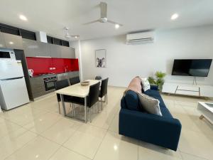 Magnum Serviced Apartmentsにあるキッチンまたは簡易キッチン