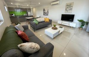 Magnum Serviced Apartmentsにあるテレビまたはエンターテインメントセンター