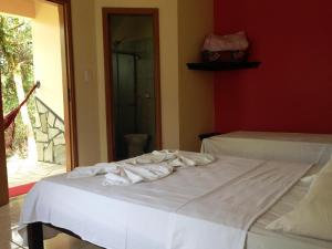 Ein Bett oder Betten in einem Zimmer der Unterkunft Águas Vivas Hotel Fazenda
