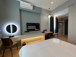 Postel nebo postele na pokoji v ubytování FUHOTEL