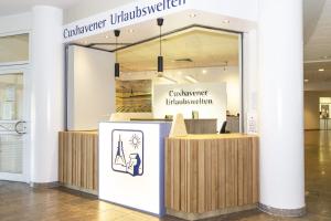 a kiosk in a lobby of a building at Kurpark-Residenz 142 in Döse