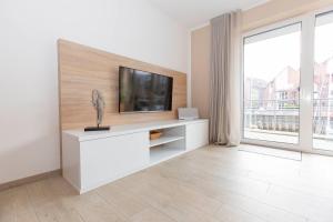 TV a/nebo společenská místnost v ubytování Marina 22-B