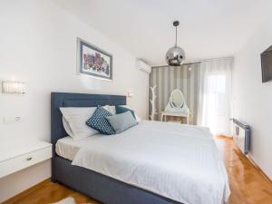 Ein Bett oder Betten in einem Zimmer der Unterkunft Villa Beauty Luxury Vodice