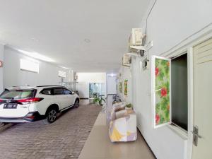 Fotografie z fotogalerie ubytování Homestay Bahari near Wisata Bahari Tlocor Sidoarjo Mitra RedDoorz v destinaci Bangil