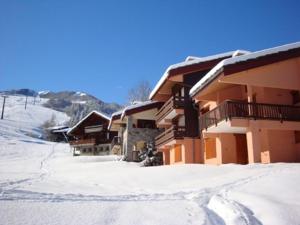 a group of buildings in the snow at Appartement Valmorel, 2 pièces, 6 personnes - FR-1-356-329 in Valmorel
