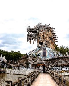 a dragon statue at the water park at Full House Homestay in Hue