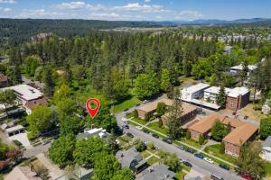 an aerial view of a suburb with a red marker at Entire Main level of Beautiful Historic Home in Spokane