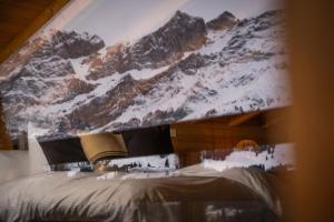 Postel nebo postele na pokoji v ubytování VILLA HUNDERT Boutique Mountainscape
