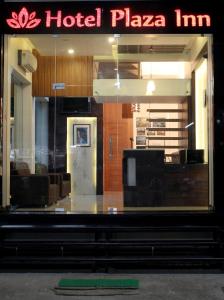 a glass window of a hotel plaza inn at Hotel Plaza Inn, Ajmer in Ajmer