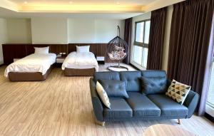 Postel nebo postele na pokoji v ubytování Long Fu Hotel