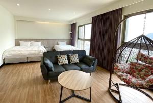 Postel nebo postele na pokoji v ubytování Long Fu Hotel